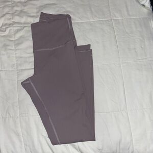 Wunder Train High-Rise Tight 25” size 6 color light plum not sure of exact color